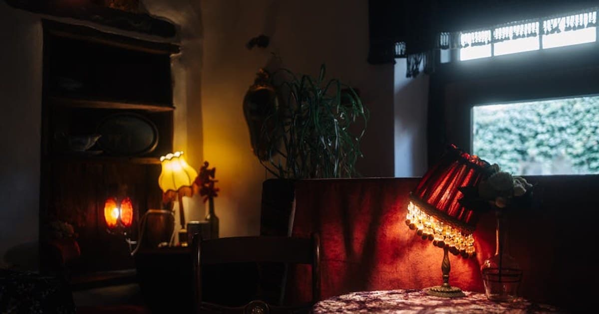 Charming vintage interior setting with warm lamp lighting and retro decor.