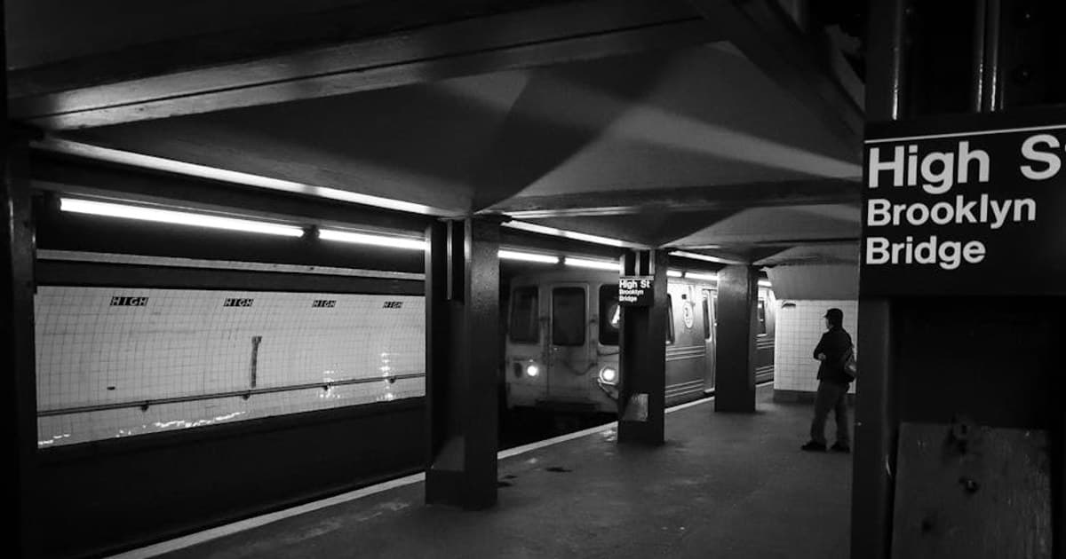 Black and white photo of High Street Brooklyn Bridge subway station, NYC.